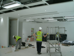 Working on Installation of Wall Partitions